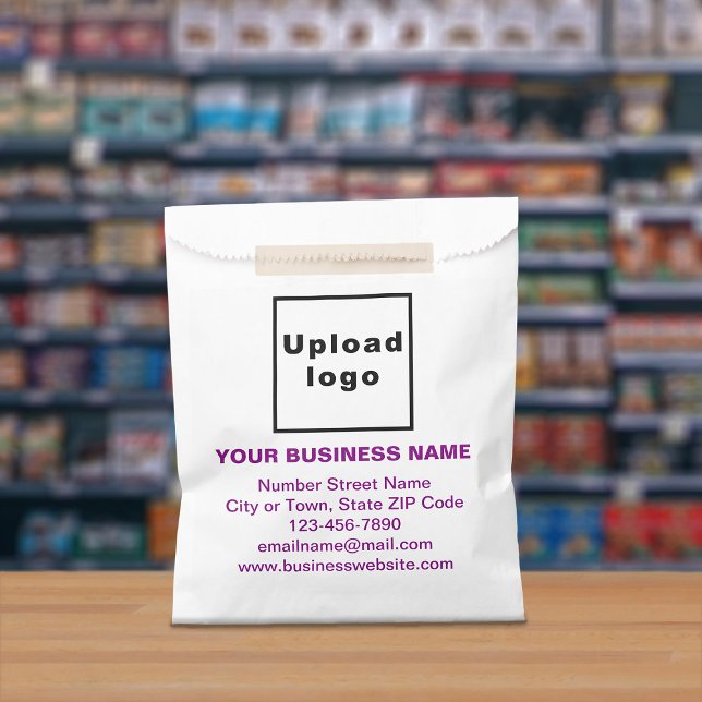 Purple Text Business Brand on Paper Bag (Paper bag with purple text business branding displayed in a store)