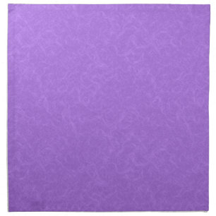 Purple textured surface with swirling pattern cloth napkin