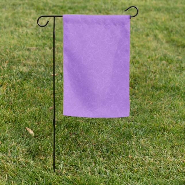 Purple textured surface with swirling pattern garden flag (In SItu)