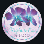 Purple Turquoise Blue Dendrobium Orchid Wedding Classic Round Sticker<br><div class="desc">Turquoise and purple blue Dendrobium orchid flower wedding sticker or envelope seal with lilac purple and turquoise watercolor background. This type of orchid is violet purple and teal or turquoise blue in color and is called a blue Dendrobium orchid. There are also other shades of purple and blue or turquoise...</div>