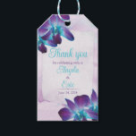 Purple Turquoise Blue Dendrobium Orchid Wedding Gift Tags<br><div class="desc">Turquoise and purple blue Dendrobium orchid flower wedding favor tags with lilac purple and turquoise watercolor background and torn edge look paper background for the wedding favor tag wording. This type of orchid is violet purple and teal or turquoise blue in color and is called a blue Dendrobium orchid. There...</div>