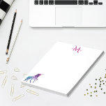 Purple unicorn white monogrammed notepad<br><div class="desc">A fantasy unicorn in turquoise,  purple and a bit pink.  White background. Template for Your name an monogram letter in purple and pink.</div>
