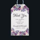 Purple Watercolor Floral Wedding Favor Thank You Gift Tags<br><div class="desc">Add a special touch to your wedding favors. This beautiful personalized gift tag has a purple floral border at the top and bottom. Blush pink roses add a pretty accent color. Thank You is written in a trendy script font. For sharing our special day with us is written in a...</div>