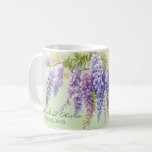 Purple watercolor floral wisteria lilac botanical  coffee mug<br><div class="desc">This watercolor painting captures the delicate beauty of purple wisteria in full bloom. The petals, rendered in varying shades of soft purple and pink, unfurl gracefully, showcasing the flower's intricate layers and natural elegance. The translucent quality of the watercolor medium enhances the wisterias ethereal charm, with subtle washes and gradients...</div>