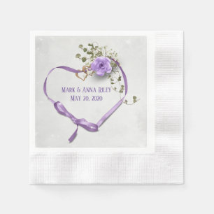 purple wedding ribbon heart with rings and rose napkins