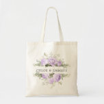 Purple White Floral Wedding Tote Bag<br><div class="desc">The wedding couple's names are surrounded by top and bottom borders of white hydrangea flowers and purple roses. There is a variety of leaves and branches that give it a very modern and chic vibe. This item is part of the Violette collection. I has templates you can use to create...</div>