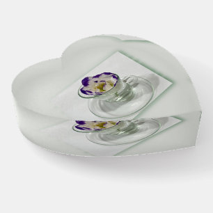 Purple white flower in a cup paperweight