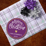 Purple White Gold Merry Christmas Classic Round Sticker<br><div class="desc">Make this holiday season extra special with our Purple White Gold Merry Christmas stickers. Whether you're embellishing your homemade gifts or sprucing up your holiday cards, these stickers are the perfect finishing touch. The sophisticated color palette of black, white, and gold adds a touch of luxury to your Christmas festivities....</div>
