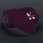 Purple Wine | Elegant Monogram Name | One-Sided Neck Tie<br><div class="desc">An elegant one-sided necktie featuring a bold white monogram across a dark Wine purple backdrop. On top of this monogram sits your first or last name spelled out in all capitals. If you prefer a bolder look for the personal name inside of the large letter you can do the following:...</div>