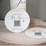 QR Code Wedding Modern Elegant Photo Sharing Round Paper Coaster<br><div class="desc">Modern & Elegant QR Code Wedding Coasters: Capture the love with these minimalist black and white QR code coasters. Featuring simple calligraphy script and a stylish modern design,  guests can easily scan the code to share photos from your celebration. A functional and elegant detail that complements any wedding decor.</div>