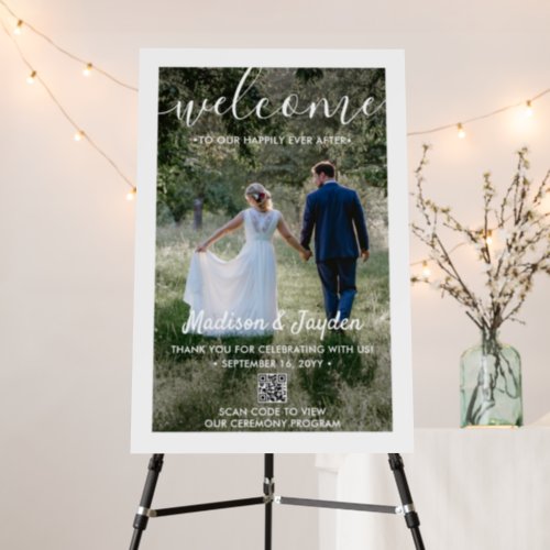 QR Code Wedding Welcome Simple Script Photo Foam Board - Welcome wedding guests to your ceremony or reception with an elegant custom photo & QR Code 20"x30" foam board sign. Picture and all text are simple to personalize. (IMAGE PLACEMENT TIP: An easy way to center a photo exactly how you want is to crop it before uploading to the Zazzle website.) By scanning the QR code with their phone camera, guests are sent directly to the wedding ceremony program, website, or other online location. The modern minimalist black and white design features one image of your choice, chic handwritten style script calligraphy, elegant vintage typography, and customizable messages that read "welcome to our happily ever after" and "thank you for celebrating with us." This wedding sign is a stylish way to share an engagement picture while adding a customized touch to your special day decorations. Congratulations to the bride and groom! Example photo is by Tim Stagge (@tim_stagge) on Unsplash.