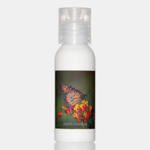 Queen butterfly on tropical milkweed hand lotion