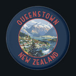 Queenstown New Zealand Retro Distressed Circle Magnet<br><div class="desc">Queenstown retro vector travel design. It sits on the shores of the South Island’s Lake Wakatipu,  set against the dramatic Southern Alps.</div>