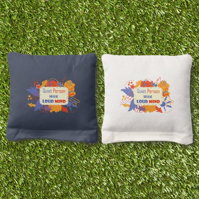 Quiet Person With Loud Mind blue yellow Cornhole Bags (Grass)