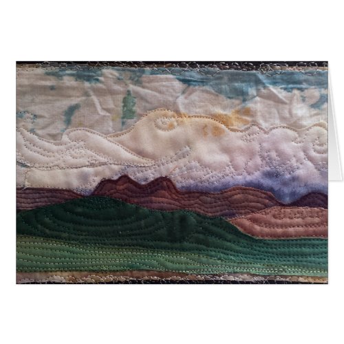 Quilted landscape hills and sky