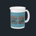 Quilting Is My Bliss Folk Art Vintage Aesthetic Beverage Pitcher<br><div class="desc">This charming folk art-inspired design beautifully celebrates the joy of quilting with warm, earthy tones and intricate details. Featuring the phrase "Quilting Is My Bliss" in a hand-stitched typography style, this piece evokes a cozy, vintage aesthetic perfect for lovers of handmade crafts. A classic quilt square with delicate floral patterns...</div>