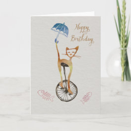 Quirky cat on a unicycle birthday card