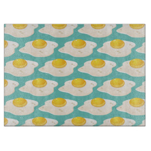 Quirky Fried Egg Graphic Pattern on Teal Cutting Board