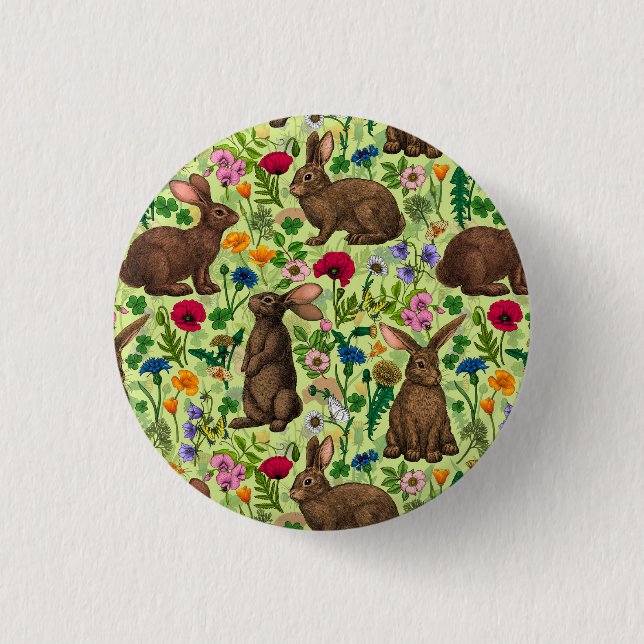 Rabbits and wildflowers on honeydew green button (Front)