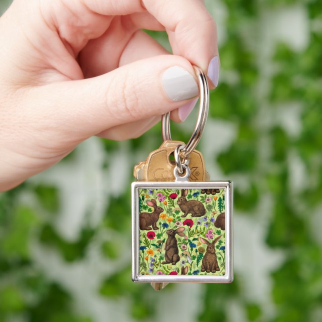 Rabbits and wildflowers on honeydew green keychain (Hand)