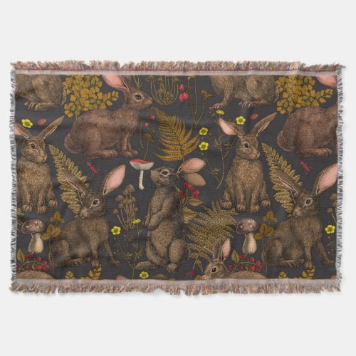 Rabbits and woodland flora Throw Blanket