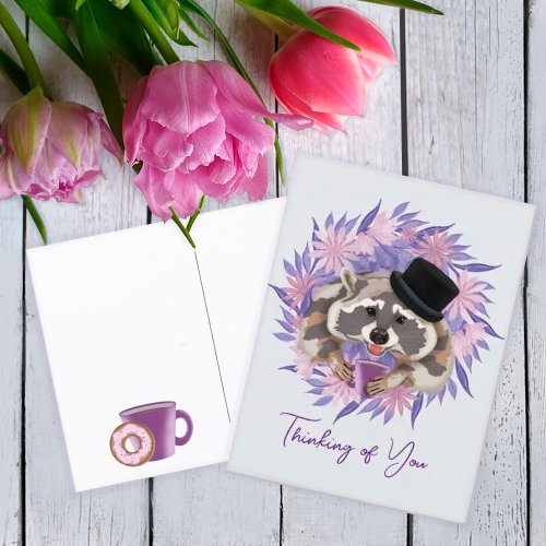 Raccoon in a hat with a mug of coffee   postcard