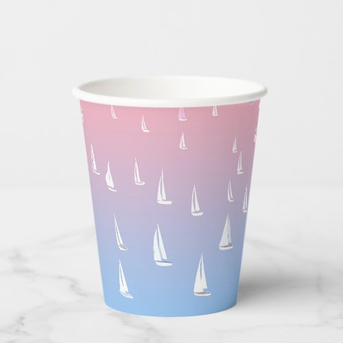 Racing sailboats in the open sea   paper cups