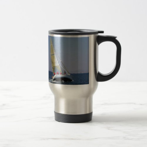 Racing yacht from behind travel mug