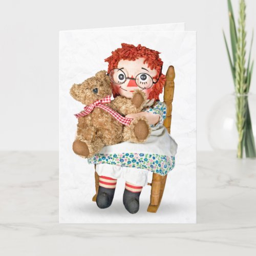 Rag doll and teddy bear in rocking chair card