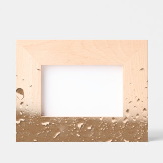 Rain drops on a window engraved frames