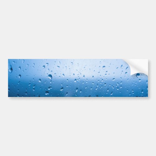 Rain drops on a window glass bumper sticker