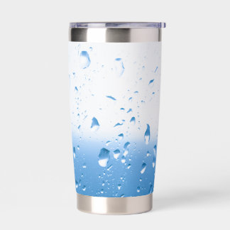 Rain drops on a window insulated tumbler