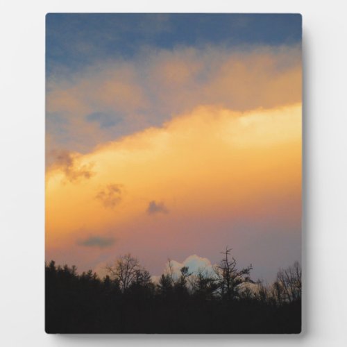 Rainbow colored clouds plaque