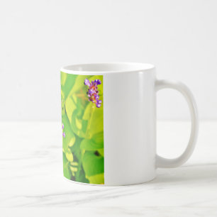 Rainbow colored Dragonfly on a purple pink flower Coffee Mug