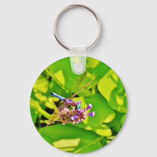 Rainbow colored Dragonfly  on a purple pink flower Keychain