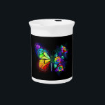 Rainbow flower butterfly beverage pitcher<br><div class="desc">Rainbow,  luminous,  artistically painted monarch butterfly with bouquet of iridescent,  bright,  luminescent roses on black background. Rainbow butterfly.</div>