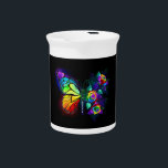 Rainbow flower butterfly beverage pitcher<br><div class="desc">Rainbow,  luminous,  artistically painted monarch butterfly with bouquet of iridescent,  bright,  luminescent roses on black background. Rainbow butterfly.</div>