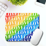 Rainbow LGBT Pride Love Is Love Mouse Pad<br><div class="desc">This colorful desk mat is decorated with a watercolor rainbow background and a Love is Love pattern in stylish white typography.</div>