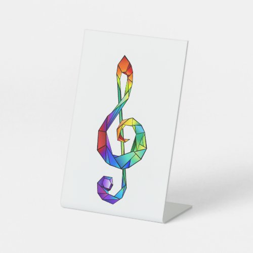 Rainbow musical key treble clef pedestal sign