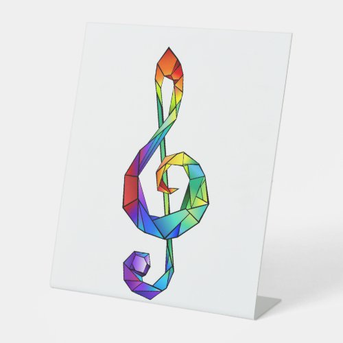 Rainbow musical key treble clef pedestal sign