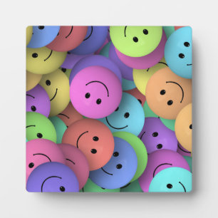 Rainbow of Colorful Happy Faces Plaque