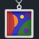 Rainbow Planets Silver Plated Necklace<br><div class="desc">The moment I thought of making the center section of this abstract design blue, my geek mind saw the rainbow colored circles as an array of planets. A piece of a large red circle fills the left third of the frame. Peeking out from behind it is near half of a...</div>