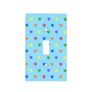 Rainbow polka hearts on baby blue light switch cover