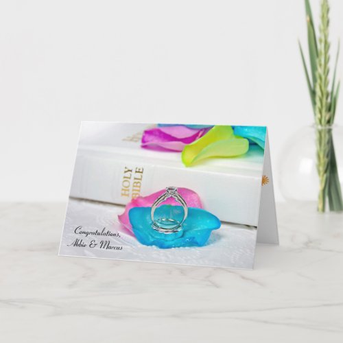 Rainbow rose petals and rings with Bible Card