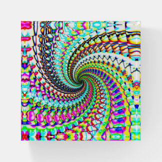 Rainbow spiral glass paperweight