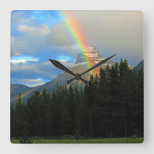 Rainbow & Stormy Skies Over Snowy Forest Mountain Square Wall Clock