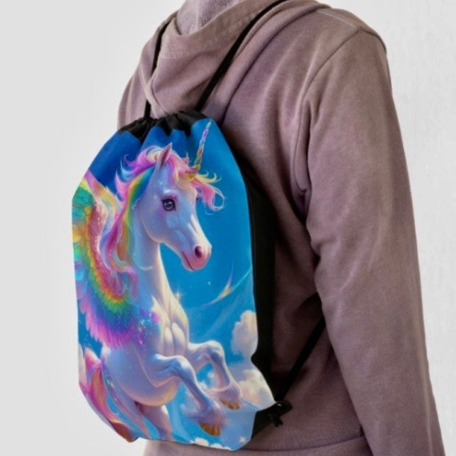 Rainbow Winged Prancing Unicorn Drawstring Bag (Made from 100% polyester constructed with reinforced black trim,  solid black back. 
)