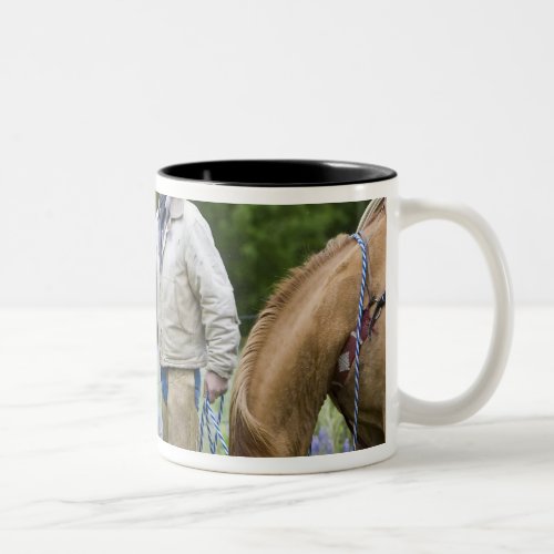 Ranchers shaking hands across the fencing in Two_Tone coffee mug