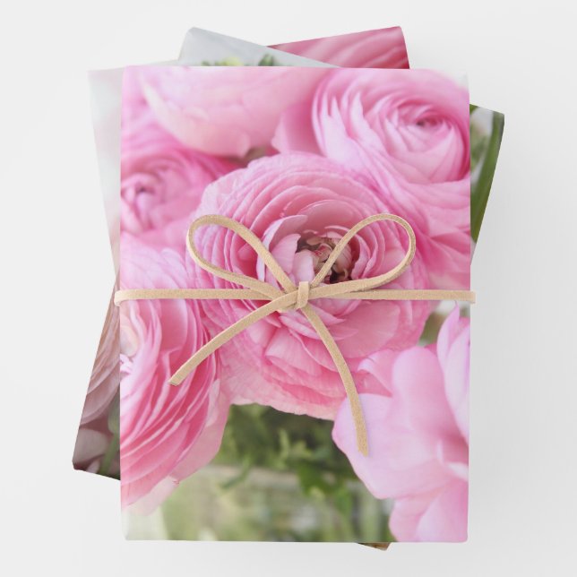 Ranuculus flowers in pink shades wrapping paper sheets (In situ)