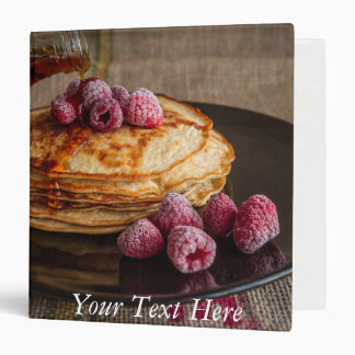 Raspberries on a stack of French Pancakes Binder